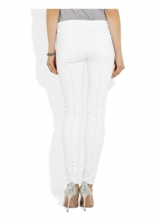 Eyelet-backed low-rise skinny jeans